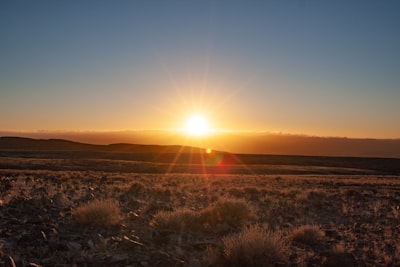Fish River Canyon - “Oranje zonsondergang boven de Fish River Canyon – spectaculaire beleving Namibië.”