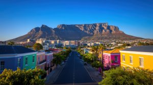 Colorful houses, city street, Table Mountain sunrise, South Africa travel
